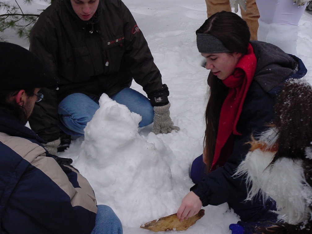WindGrowler SF2002 11 Nala sculpting a snow racoon